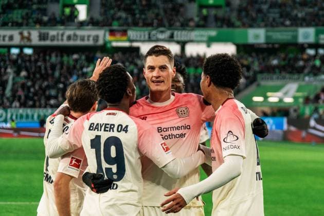 Germany, Soccer, 1 Bundesliga 2025 26, Matchday 11 VfL Wolfsburg vs Bayer Leverkusen Volkswagen Arena Wolfsburg Patrik Schick 14, Bayer Leverkusen , Ernest Poku 19, Bayer Leverkusen and scorer Malik Tillman 10, Leverkusen Goal celebration to 3 0 Copyright: xJamesxZabelx