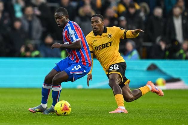 Wolverhampton, England, 22nd November 2025. Tyrick Mitchell of Crystal Palace in action during the Wolverhampton Wanderers vs Crystal Palace Premier League match at Molineux, Wolverhampton. Picture credit should read: Craig Thomas Sportimage EDITORIAL USE ONLY. No use with unauthorised audio, video, data, fixture lists, club league logos or live services. Online in-match use limited to 120 images, no video emulation. No use in betting, games or single club league player publications. SPI-4302_WOLVES_V_CRYSTAL_PALACE-060 SPI-4302-0060