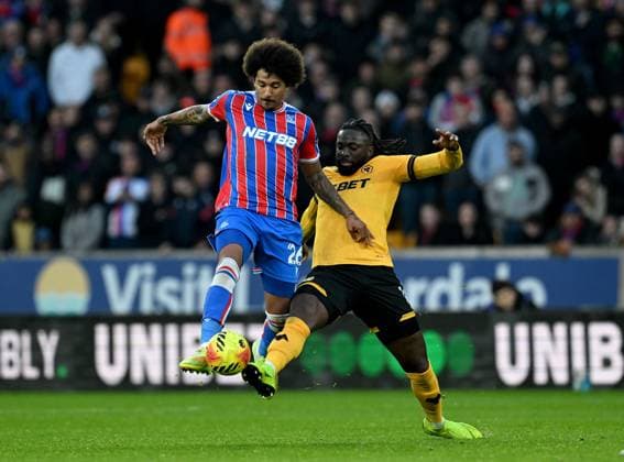 Chris Richards of Crystal Palace and Tolu Arokodare of Wolverhampton Wanderers Wolverhampton Wanderers v Crystal Palace, Premier League, Football, Molineux, Wolverhampton, UK - 22 Nov 2025Wolverhampton Molineux United Kingdom EDITORIAL USE ONLY No use with unauthorised audio, video, data, fixture lists, club league logos or live services. Online in-match use limited to 120 images, no video emulation. No use in betting, games or single club league player publications.  Copyright: xAnnaxGowthorpe Shutterstockx 15860649s