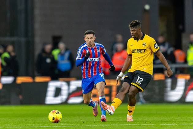 Wolverhampton Wanderers v Crystal Palace Premier League 22 11 2025. Wolverhampton Wanderers defender Emmanuel Agbadou (12) plays a pass during the Premier League match between Wolverhampton Wanderers and Crystal Palace at Molineux, Wolverhampton, England on 22 November 2025. Editorial use only DataCo restrictions apply See www.football-dataco.com , Copyright: xManjitxNarotrax PSI-23244-0026