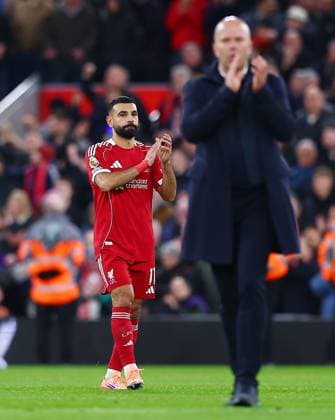 Mohamed Salah of Liverpool thanks the fans at the end of the match behind manager Arne Slot Liverpool v Nottingham Forest, Premier League, Football, Anfield, Liverpool, UK - 22 Nov 2025Liverpool Anfield United Kingdom EDITORIAL USE ONLY No use with unauthorised audio, video, data, fixture lists, club league logos or live services. Online in-match use limited to 120 images, no video emulation. No use in betting, games or single club league player publications. Copyright: xMattxWest Shutterstockx 15860648ba