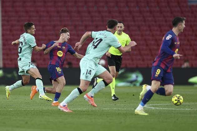 FC Barcelona, Barca v Athletic Bilbao - LaLiga BARCELONA, SPAIN - NOVEMBER 22: Barcelona s midfielder Fermin Lopez vies with Athletic Bilbao s Galarreta during the Spanish league football match between FC Barcelona and Athletic Club Bilbao at Camp Nou Stadium in Barcelona on November 22, 2025. Adria Puig Anadolu Barcelona Spain. Editorial use only. Please get in touch for any other usage.  Copyright: x2025xAnadoluxAdriaxPuigx