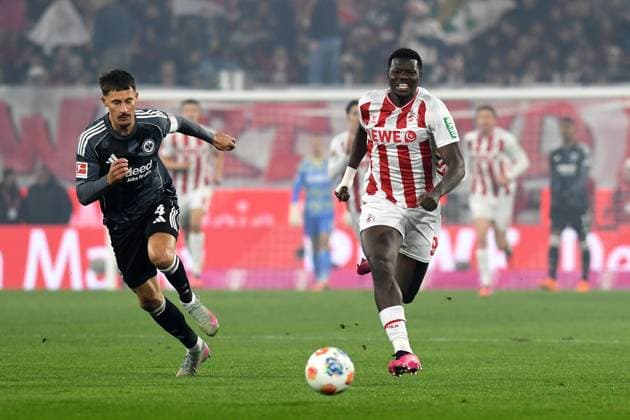Robin Koch Eintracht Frankfurt and Ragnar Ache 1 FC Koeln battle for the ball during the Bundesliga match between 1 FC Köln and Eintracht Frankfurt at RheinEnergieSTADION on November 22, 2025 in Cologne, Germany, Germany Photo by Ralf Treese DeFodi Images Robin Koch Eintracht Frankfurt and Ragnar Ache 1 FC Koeln battle for the ball during the Bundesliga match between 1 FC Köln and Eintracht Frankfurt at RheinEnergieSTADION on November 22, 2025 in Köln, Germany Photo by Ralf Treese DeFodi Images DFL regulations prohibit any use of photographs as image sequences and or quasi video Photo by Ralf Treese DeFodi Images
