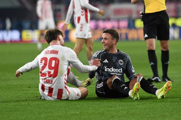 Mario Goetze Eintracht Frankfurt and Jan Thielmann 1 FC Koeln laughing during the Bundesliga match between 1 FC Köln and Eintracht Frankfurt at RheinEnergieSTADION on November 22, 2025 in Cologne, Germany, Germany Photo by Ralf Treese DeFodi Images Mario Goetze Eintracht Frankfurt and Jan Thielmann 1 FC Koeln laughing during the Bundesliga match between 1 FC Köln and Eintracht Frankfurt at RheinEnergieSTADION on November 22, 2025 in Köln, Germany Photo by Ralf Treese DeFodi Images DFL regulations prohibit any use of photographs as image sequences and or quasi video Photo by Ralf Treese DeFodi Images