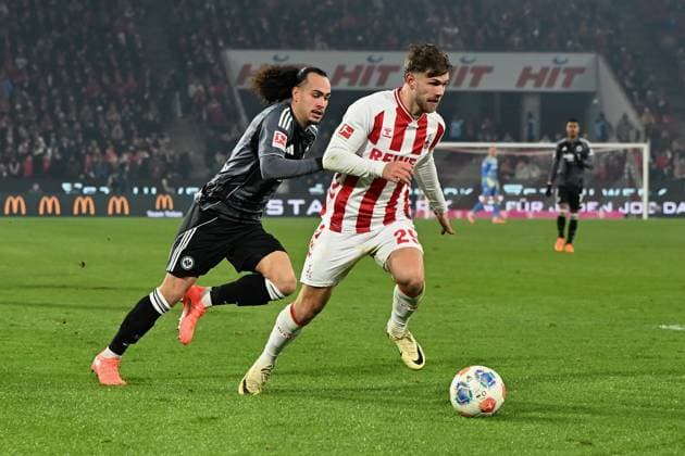 Arthur Theate Eintracht Frankfurt and Jan Thielmann 1 FC Koeln battle for the ball during the Bundesliga match between 1 FC Köln and Eintracht Frankfurt at RheinEnergieSTADION on November 22, 2025 in Cologne, Germany, Germany Photo by Ralf Treese DeFodi Images Arthur Theate Eintracht Frankfurt and Jan Thielmann 1 FC Koeln battle for the ball during the Bundesliga match between 1 FC Köln and Eintracht Frankfurt at RheinEnergieSTADION on November 22, 2025 in Köln, Germany Photo by Ralf Treese DeFodi Images DFL regulations prohibit any use of photographs as image sequences and or quasi video Photo by Ralf Treese DeFodi Images