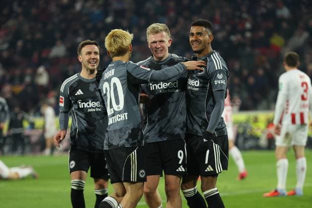 22 11 2025, Soccer Bundesliga, 1 FC Köln Eintracht Frankfurt, v l , Goal celebration to 1 4 by Jonathan Burkardt Eintracht Frankfurt , Mario Götze Eintracht Frankfurt , Ritsu Doan Eintracht Frankfurt , Ansgar Knauff Eintracht Frankfurt , Goal celebration, celebrate the goal DFL DFB REGULATIONS PROHIBIT ANY USE OF PHOTOGRAPHS AS IMAGE SEQUENCES AND OR QUASI VIDEO xdcx Copyright: HMBxMedia Claus