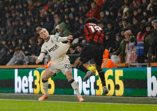 22nd November 2025, Bournemouth, Dorset, England; Premier League Football, AFC Bournemouth versus West Ham United; Bowen of West Ham competes with Adams of Bournemouth  HongboxChen