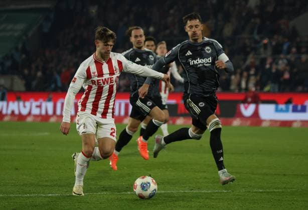 v l Jan Thielmann 1 FC Koeln 29 , Arthur Theate Eintracht Frankfurt 03 , Robin Koch Eintracht Frankfurt 04 GER, 1 FC Koeln vs Eintracht Frankfurt, Football, Bundesliga, Matchday 11, Season 2025 2026, 22 11 2025 DFL DFB REGULATIONS PROHIBIT ANY USE OF PHOTOGRAPHS as IMAGE SEQUENCES and or QUASI VIDEO GER, 1 FC Koeln vs Eintracht Frankfurt, Football, Bundesliga, Matchday 11, Season 2025 2026, 22 11 2025 Koeln Copyright: xEibner-Pressefotox xThomasxStoeckerx EP_TSR