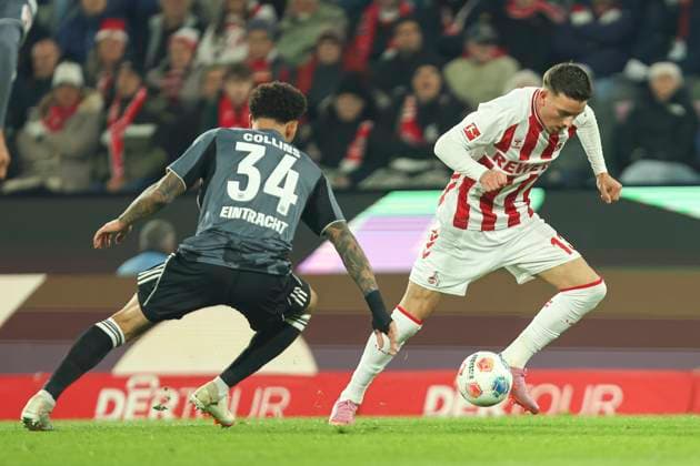 Nnamdi Collins Eintracht Frankfurt and Said El Mala 1 FC Koeln in a duel during the Bundesliga match between 1 FC Köln and Eintracht Frankfurt, RheinEnergieSTADION on November 22, 2025 in Cologne, Germany, Germany Photo by Oliver Kaelke DeFodi Images Nnamdi Collins Eintracht Frankfurt and Said El Mala 1 FC Koeln battle for the ball during the Bundesliga match between 1 FC Köln and Eintracht Frankfurt at RheinEnergieSTADION on November 22, 2025 in Köln, Germany Photo by Oliver Kaelke DeFodi Images DFL regulations prohibit any use of photographs as image sequences and or quasi video Photo by Oliver Kaelke DeFodi Images