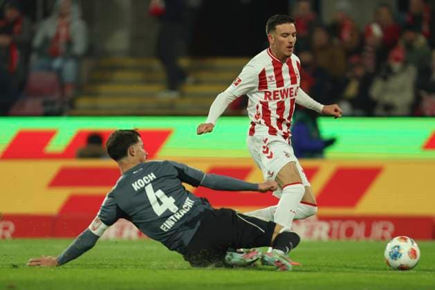 Robin Koch Eintracht Frankfurt and Said El Mala 1 FC Koeln battle for the ball during the Bundesliga match between 1 FC Köln and Eintracht Frankfurt at RheinEnergieSTADION on November 22, 2025 in Cologne, Germany, Germany Photo by Oliver Kaelke DeFodi Images Robin Koch Eintracht Frankfurt and Said El Mala 1 FC Koeln battle for the ball during the Bundesliga match between 1 FC Köln and Eintracht Frankfurt at RheinEnergieSTADION on November 22, 2025 in Köln, Germany Photo by Oliver Kaelke DeFodi Images DFL regulations prohibit any use of photographs as image sequences and or quasi video Photo by Oliver Kaelke DeFodi Images