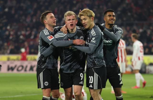 22 11 2025, Soccer Bundesliga, 1 FC Köln Eintracht Frankfurt, v l , Goal celebration to 1 3 by Jonathan Burkardt Eintracht Frankfurt , Mario Götze Eintracht Frankfurt , Ritsu Doan Eintracht Frankfurt , Ansgar Knauff Eintracht Frankfurt , Goal celebration, celebrate the goal DFL DFB REGULATIONS PROHIBIT ANY USE OF PHOTOGRAPHS AS IMAGE SEQUENCES AND OR QUASI VIDEO xdcx Copyright: HMBxMedia Claus