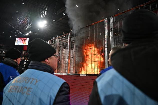 Football, 1st BL, 1. FC Köln - Eintracht Frankfurt, fire in the visitors block
