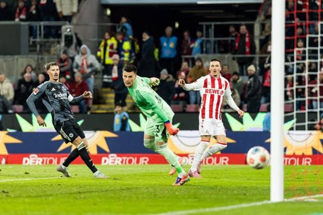 KOELN, GERMANY - NOVEMBER 25: Said El Mala (1. FC Koeln, 13) hitting the goal post trying to score against Michael Zetterer (Eintracht Frankfurt, 23) during the Bundesliga match between 1. FC Koeln vs. Eintracht Frankfurt at Rheinenergie-Stadion on matchday 11 of the 1. Bundesliga on November 22, 2025 in Koeln, Germany. DFL REGULATIONS PROHIBIT ANY USE OF PHOTOGRAPHS AS IMAGE SEQUENCES AND OR QUASI-VIDEO. North Rhine Westphalia Germany Copyright: xBEAUTIFULxSPORTS Wunderlx