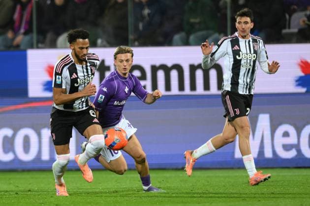 22nd November 2025, Artemio Franchi Stadium, Florence, Italy; Italian Serie A Football; Fiorentina versus Juventus; Weston McKennie of FC Juventus under pressure from Albert Guomundsson of AC Fiorentina  AllShotLive
