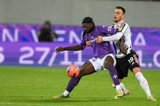 22nd November 2025, Artemio Franchi Stadium, Florence, Italy; Italian Serie A Football; Fiorentina versus Juventus; Moise Kean of AC Fiorentina holds off Filip Kostic of FC Juventus  AllShotLive
