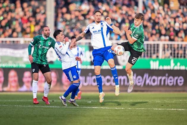 22 11 2025, Football, 2 Bundesliga, Season 2025 2026, Matchday 13, Preußen Münster FC Schalke 04, Janik Bachmann FC Schalke 04 , Jano ter Horst Preußen Münster xRHR PHOTO YYx Copyright: KROEGER RHR-FOTOx RHR-FOTO YY