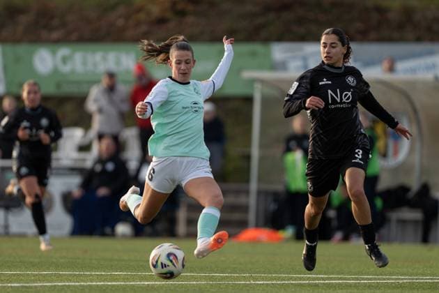 21 11 2025, Football, 2 Womens Bundesliga, 2025 2026, Matchday 11, SG 99 Andernach VfR Schwarz Weiss Warbeyen 1945 e V Lisa Kossmann 6 Andernach gets a shot off Ebla Gouriye 3 Warbeyen arrives too late