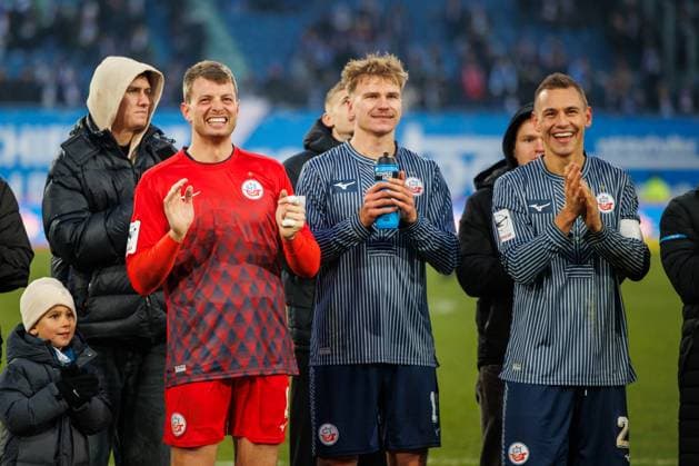 Victory celebration from l Goalkeeper Benjamin Uphoff Rostock , Florian Carstens Rostock and Franz Pfanne Rostock GER, FC Hansa Rostock vs 1 FC Schweinfurth 05, Soccer, Men, 3 Liga, Matchday 15, Season 2025 2026, 22 11 2025 Rostock Ostseestadion Mecklenburg Vorpommern Germany