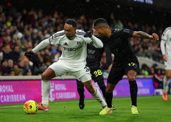 22nd November 2025; Craven Cottage, Fulham, London, England; Premier League Football, Fulham versus Sunderland; Kenny Tete of Fulham challenged by Reinildo Mandava of Sunderland  JohnxPatrickxFletcher