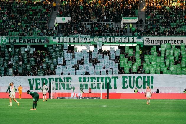 Germany, Football, 1 Bundesliga 2025 26, 11 Matchday VfL Wolfsburg vs Bayer Leverkusen Volkswagen Arena Wolfsburg Fan Project Banner VfL Wolfsburg Home Curve Clubs defend yourselves Copyright: xJamesxZabelx