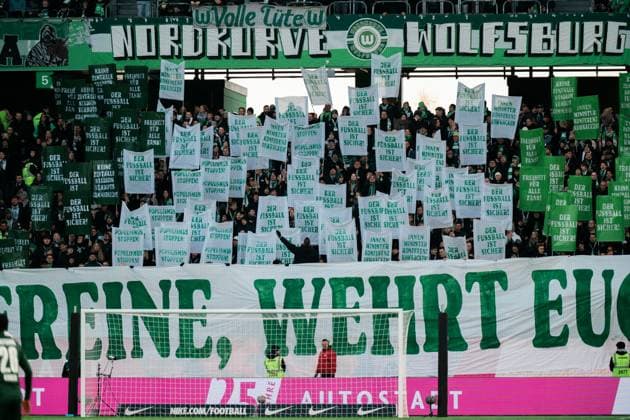 Germany, Football, 1 Bundesliga 2025 26, 11 Matchday VfL Wolfsburg vs Bayer Leverkusen Volkswagen Arena Wolfsburg Fan Project Banner VfL Wolfsburg Home Curve Clubs defend yourselves Copyright: xJamesxZabelx