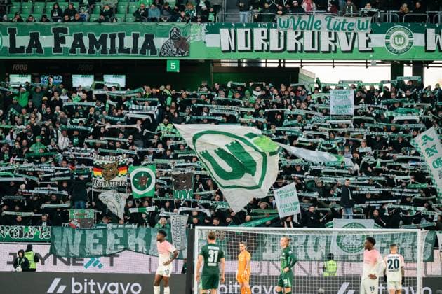 Germany, Soccer, 1 Bundesliga 2025 26, Matchday 11 VfL Wolfsburg vs Bayer Leverkusen Volkswagen Arena Wolfsburg Banners and flags VfL Wolfsburg home curve Copyright: xJamesxZabelx