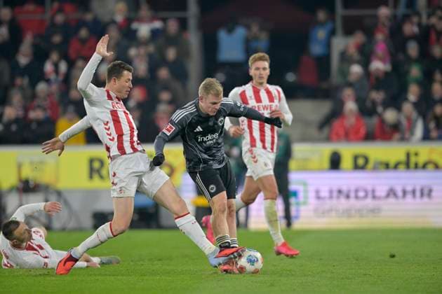Jonathan Burkardt Eintracht Frankfurt shoots the goal to 1 4, action, against Dominique Heintz l 1 FC Köln , Jonathan Burkardt Eintracht Frankfurt , Soccer 1 Bundesliga, 11 Matchday, 1 FC Koeln Eintracht Frankfurt 3 4, on 22 11 2025 in Koeln Germany DFL regulations prohibit any use of photographs as image sequences and or quasi video Â