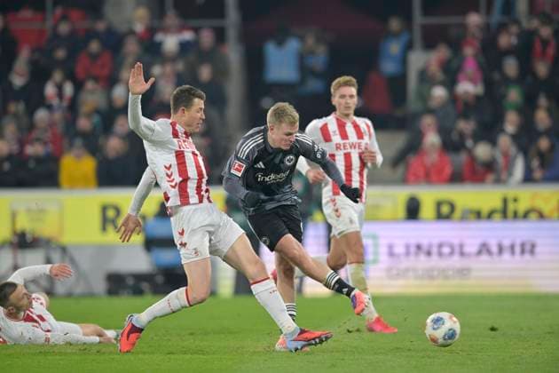 Jonathan Burkardt Eintracht Frankfurt shoots the goal to 1 4, action, against Dominique Heintz l 1 FC Köln , Jonathan Burkardt Eintracht Frankfurt , Soccer 1 Bundesliga, 11 Matchday, 1 FC Koeln Eintracht Frankfurt 3 4, on 22 11 2025 in Koeln Germany DFL regulations prohibit any use of photographs as image sequences and or quasi video Â