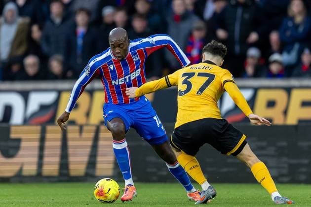 Wolverhampton Wanderers v Crystal Palace Premier League 22 11 2025. Crystal Palace forward Jean-Philippe Mateta (14) battles for possession during the Premier League match between Wolverhampton Wanderers and Crystal Palace at Molineux, Wolverhampton, England on 22 November 2025. Editorial use only DataCo restrictions apply See www.football-dataco.com , Copyright: xManjitxNarotrax PSI-23244-0130
