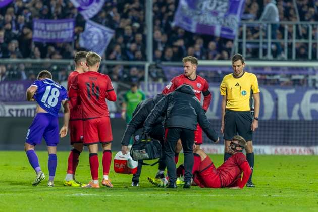 Osnabrück, Germany 22 November 2025 3 Liga 2025 2026 VfL Osnabrück vs FC Ingolstadt 04 In the picture Yannick Deichmann FCI injured on the ground after duel DFB regulations prohibit any use of photographs as image sequences and or quasi video Bremer Brücke Niedersachsen Copyright: xFotostandx xSchäferx