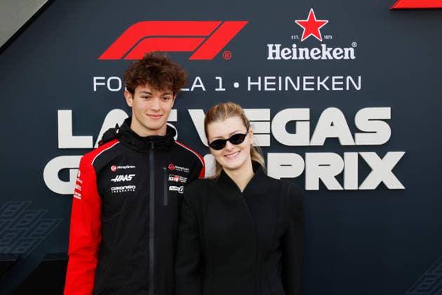 LAS VEGAS, NV - NOVEMBER 22: Oliver Bearman, driver of the 87 Haas F1 Team poses for photos on the red carpet with Alicia Torriani prior to the the Formula 1 Las Vegas Grand Prix on November 22, 2025 on the Las Vegas Strip Circuit in Las Vegas, Nevada.(Photo by Jeff Speer Icon Sportswire) AUTO: NOV 22 F1 Las Vegas Grand Prix EDITORIAL USE ONLY Icon2511220511