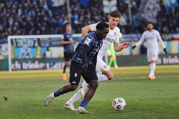 v li in duel,Kennedy Onyedika Okpala SV Waldhof Mannheim, 32 , Jakob Lewald SV Waldhof Mannheim II, 26 GER, SV Waldhof Mannheim vs SV Wehen Wiesbaden, Football, 3 Liga, Matchday 15, Season 2025 2026, 22 11 2025 DFL DFB REGULATIONS PROHIBIT ANY USE OF PHOTOGRAPHS as IMAGE SEQUENCES and or QUASI VIDEO GER,SV Waldhof Mannheim vs SV Wehen Wiesbaden, Football, 3 Liga, Matchday 15, Season 2025 2026, 22 11 2025 Mannheim Copyright: xEibner-Pressefoto JoergxHirschx EP_JHH