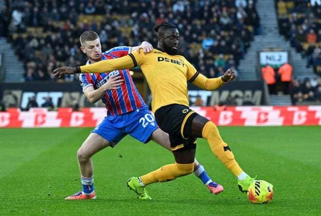 Adam Wharton of Crystal Palace and Tolu Arokodare of Wolverhampton Wanderers Wolverhampton Wanderers v Crystal Palace, Premier League, Football, Molineux, Wolverhampton, UK - 22 Nov 2025Wolverhampton Molineux United Kingdom EDITORIAL USE ONLY No use with unauthorised audio, video, data, fixture lists, club league logos or live services. Online in-match use limited to 120 images, no video emulation. No use in betting, games or single club league player publications.  Copyright: xAnnaxGowthorpe Shutterstockx 15860649be