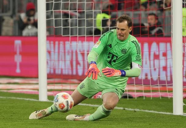 (251123) -- MUNICH, Nov. 23, 2025 -- Bayern Munich s goalkeeper Manuel Neuer makes a save during the German first division Bundesliga football match between Bayern Munich and SC Freiburg in Munich, Germany, Nov. 22, 2025. (Photo by Xinhua) (SP)GERMANY-MUNICH-FOOTBALL-BUNDESLIGA-BAYERN MUNICH VS FREIBURG PhilippexRuiz 