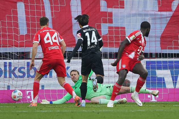 (251123) -- MUNICH, Nov. 23, 2025 -- Bayern Munich s goalkeeper Manuel Neuer (rear) makes a save during the German first division Bundesliga football match between Bayern Munich and SC Freiburg in Munich, Germany, Nov. 22, 2025. (Photo by Xinhua) (SP)GERMANY-MUNICH-FOOTBALL-BUNDESLIGA-BAYERN MUNICH VS FREIBURG PhilippexRuiz 