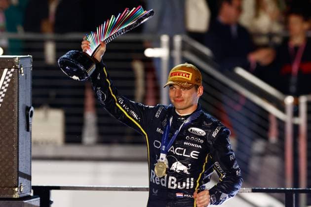 LAS VEGAS, NV - NOVEMBER 22: Race winner Max Verstappen, driver of the 1 Red Bull Racing celebrates with the trophy after the Formula 1 Las Vegas Grand Prix on November 22, 2025 on the Las Vegas Strip Circuit in Las Vegas, Nevada.(Photo by Jeff Speer Icon Sportswire) AUTO: NOV 22 F1 Las Vegas Grand Prix EDITORIAL USE ONLY Icon2511220701