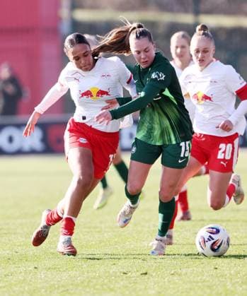 Leipzig, 23 11 2025, Red Bull Campus, Soccer, 1 Bundesliga, Women 11 Matchday , RB Leipzig vs Vfl Wolfsburg , Pictured from left Lisa Baum 11, Leipzig , Janou Levels 15, Wolfsburg , For editorial use only Only editorial use , DFL DFB regulations prohibit any use of photographs as image sequences and or quasi video ,