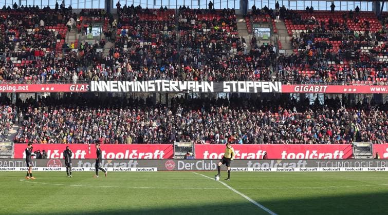 23 11 2025 Soccer Season 2025 2026 2 Soccer Bundesliga 13 Matchday 1 FC Nürnberg FCN Club DSC Arminia Bielefeld Sportfoto Zink DaMa xdaxmax DFL regulations prohibit any use of photographs as image sequences and or quasi video only for editorial use Banner banner of Clubfan Clubfans FCN Fans Fans before the start of the match Innenministerwahn stoppen