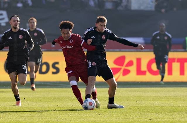 23 11 2025 Soccer season 2025 2026 2 Soccer Bundesliga 13 Matchday 1 FC Nürnberg FCN Club DSC Arminia Bielefeld Sportfoto Zink DaMa xdaxmax DFL regulations prohibit any use of photographs as image sequences and or quasi video only for editorial use Monju Momuluh 14, Arminia Bielefeld Adam Markhiev 6, 1 FC Nürnberg FCN