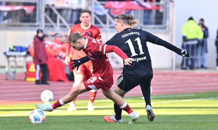 23 11 2025 Soccer Season 2025 2026 2 Soccer Bundesliga 13 Matchday 1 FC Nürnberg FCN Club DSC Arminia Bielefeld Sportfoto Zink xwoxzix DFL regulations prohibit any use of photographs as image sequences and or quasi video only for editorial use Tim Handwerker 29, Arminia Bielefeld Artem Stepanov 11, 1 FC Nürnberg FCN