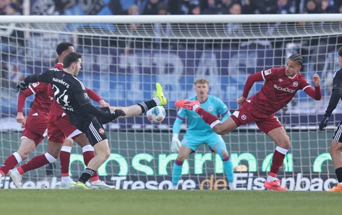 23 11 2025 Soccer Season 2025 2026 2 Soccer Bundesliga 13 Matchday 1 FC Nürnberg FCN Club DSC Arminia Bielefeld Sportfoto Zink DaMa xdaxmax DFL regulations prohibit any use of photographs as image sequences and or quasi video only for editorial use Luka Lochoshvili 24, 1 FC Nürnberg FCN Joel Felix 3, Arminia Bielefeld