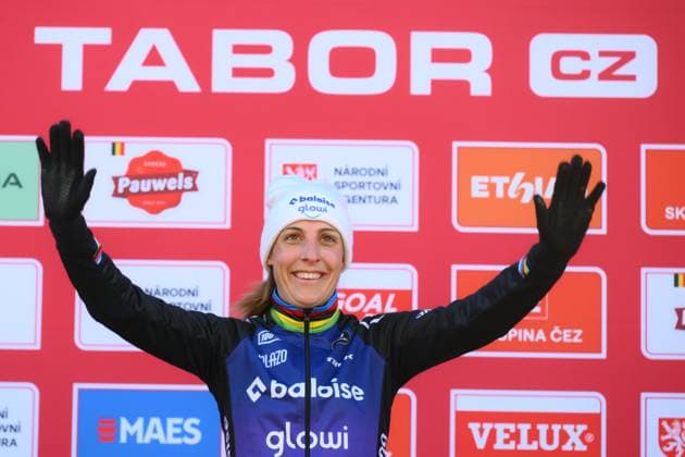 Dutch Lucinda Brand celebrates on the podium after winning the women elite race at the World Cup cyclocross cycling event in Tabor, Czech Republic, stage 1 (out of 12) of the UCI World Cup cyclocross competition, Sunday 23 November 2025. DAVIDxPINTENS  x143633536x
