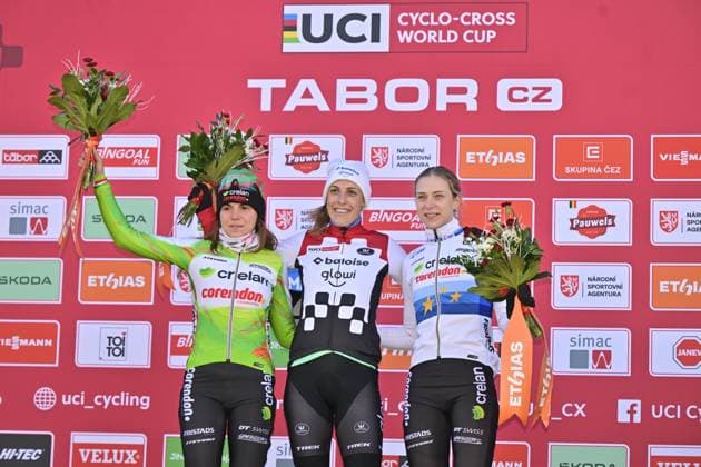 From left: second Sara Casasola from Italy, first Lucinda Brand from Netherlands and third Inge van der Heijden from Netherlands on the podium after the UCI Cyclo-cross World Cup race, category Elite Women, in Tabor, Czech Republic, on November 23, 2025. (CTKxPhoto VaclavxPancer) CTKPhotoP2025112303227  CTKPhotoP2025112303227