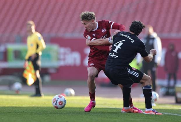 23 11 2025 Soccer Season 2025 2026 2 Soccer Bundesliga 13 Matchday 1 FC Nuremberg FCN Club DSC Arminia Bielefeld Sportfoto Zink DaMa xdaxmax DFL regulations prohibit any use of photographs as image sequences and or quasi video only for editorial use Joel Grodowski 11, Arminia Bielefeld Fabio Gruber 4, 1 FC Nuremberg FCN