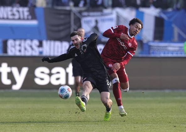 23 11 2025 Soccer season 2025 2026 2 Soccer Bundesliga 13 Matchday 1 FC Nürnberg FCN Club DSC Arminia Bielefeld Sportfoto Zink DaMa xdaxmax DFL regulations prohibit any use of photographs as image sequences and or quasi video only for editorial use Luka Lochoshvili 24, 1 FC Nürnberg FCN Monju Momuluh 14, Arminia Bielefeld