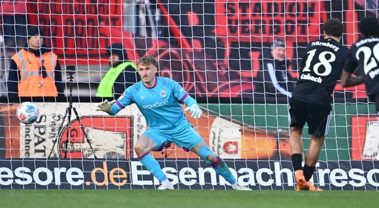 23 11 2025 Soccer Season 2025 2026 2 Soccer Bundesliga 13 Matchday 1 FC Nürnberg FCN Club DSC Arminia Bielefeld Sportfoto Zink xwoxzix DFL regulations prohibit any use of photographs as image sequences and or quasi video only for editorial use Rafael Lubach 18, 1 FC Nürnberg FCN scores Goal Goal shot for 1 0 against Jonas Kersken 1, Arminia Bielefeld by penalty kick Penalty kick