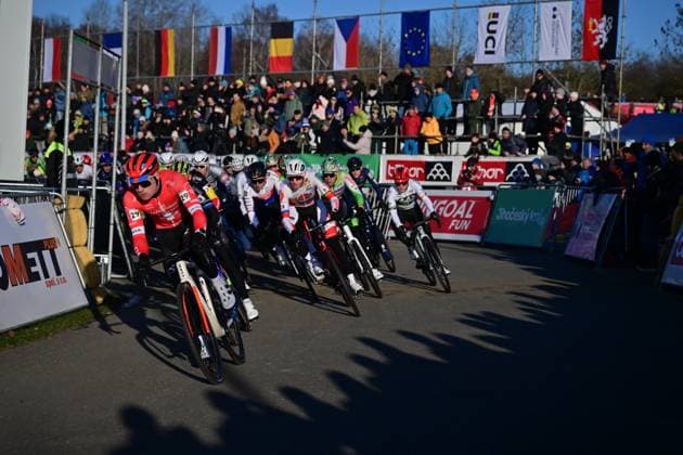 Kevin Kuhn from Switzerland (left) competes in the UCI Cyclo-cross World Cup race, category Elite Men, in Tabor, Czech Republic, on November 23, 2025. (CTKxPhoto VaclavxPancer) CTKPhotoP2025112303493  CTKPhotoP2025112303493