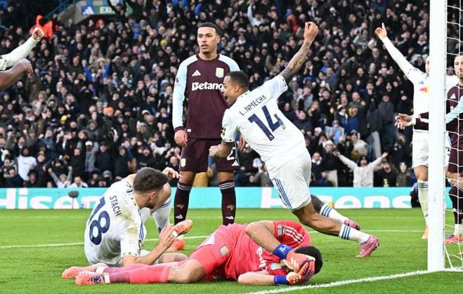 Lukas Nmecha of Leeds United celebrates after scoring the team s first goal Leeds United v Aston Villa, Premier League, Football, Elland Road, Leeds, UK - 23 Nov 2025Leeds Elland Road United Kingdom EDITORIAL USE ONLY No use with unauthorised audio, video, data, fixture lists, club league logos or live services. Online in-match use limited to 120 images, no video emulation. No use in betting, games or single club league player publications.  Copyright: xAnnaxGowthorpe Shutterstockx 15860945ac