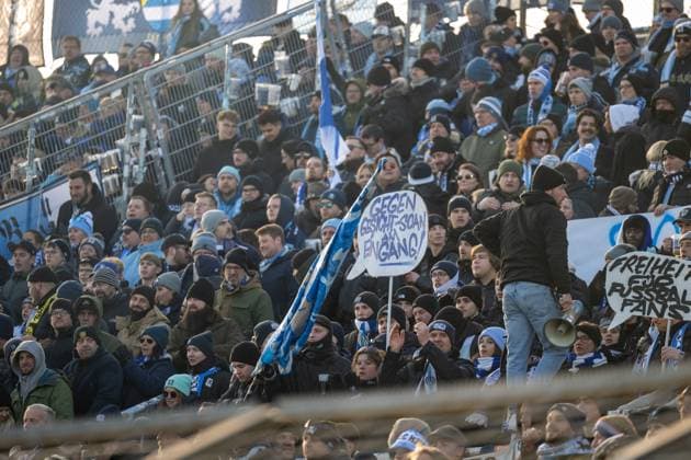 Fans of TSV 1860 Muenchen with Plkaten, TSV 1860 Muenchen vs 1 FC Saarbruecken, 3 Liga, 15 Spieltag, 23 11 2025 DFB regulations prohibit any use of photographs as image sequences and or quasi video Muenchen Bayern Germany Copyright: xkolbert-press UlrichxGamelx