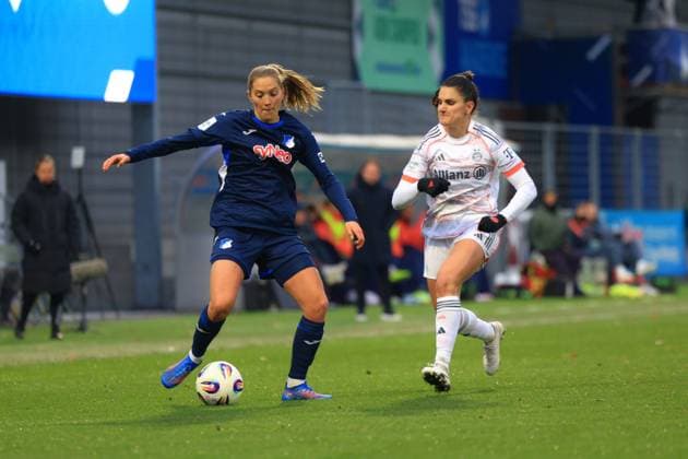 Lisann Kaut 4 TSG Hoffenheim women in a duel with Jovana Damnjanovic 9 FC Bayern Munich for the ball Duel for the ball Copyright: xspeedshotx